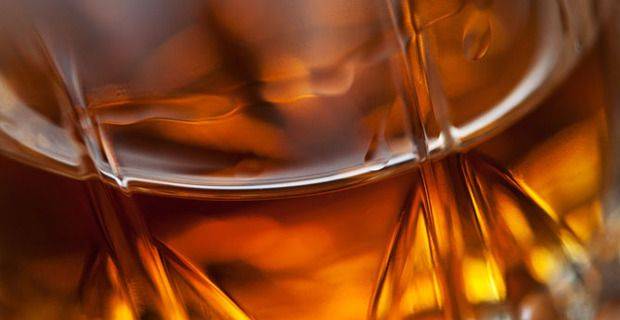 Glass of Malt Whisky in a Crystal Glass Closeup