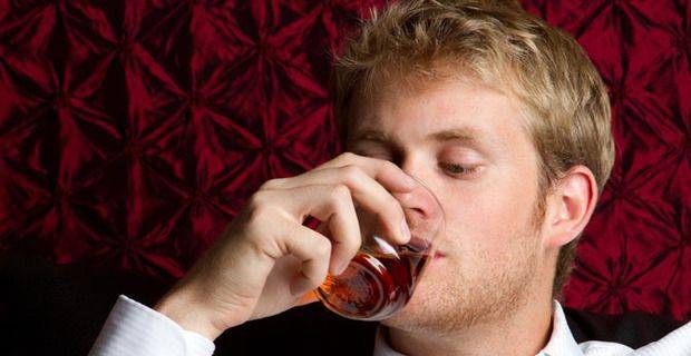 Peaty Nose Ltd: Man Drinking Scottish Malt Whisky
