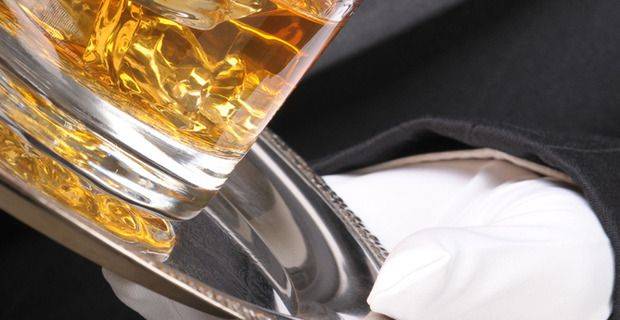 Glass of Whisky Served on Silver Tray